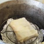 smoked lard in a cauldron